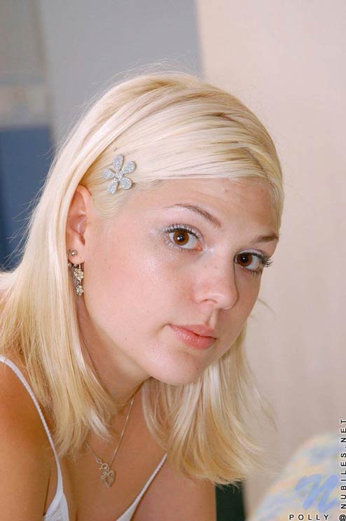 Sweet cute teen goes topless and spreads her pussy